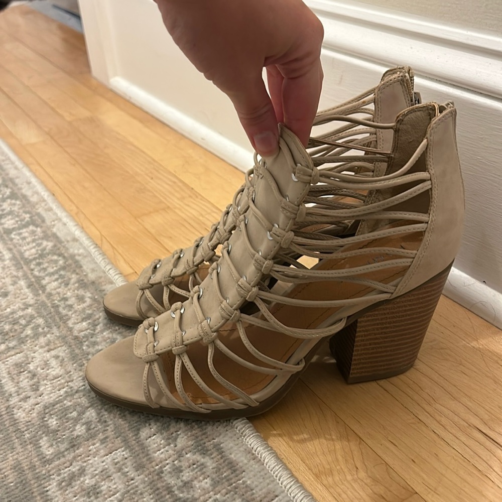 Size 8 1/2 heels. Worn twice for a trip in Mexico!